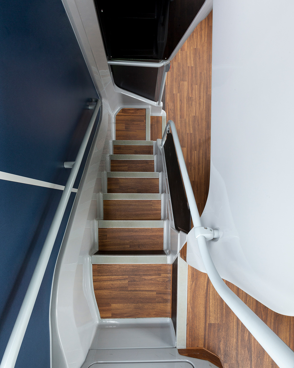 Altro Transflor Wood installed on the stairwell of a Reading Buses bus
